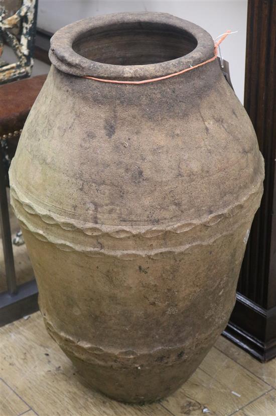 A terracotta oil jar, W.40cm